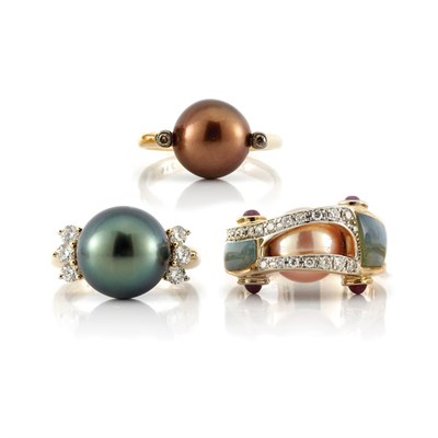 Lot 109 - Three Gold and Colored Cultured and Freshwater Pearl Rings