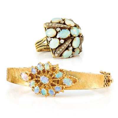 Lot 639 - Gold and Opal Bangle-Watch and Dome Ring