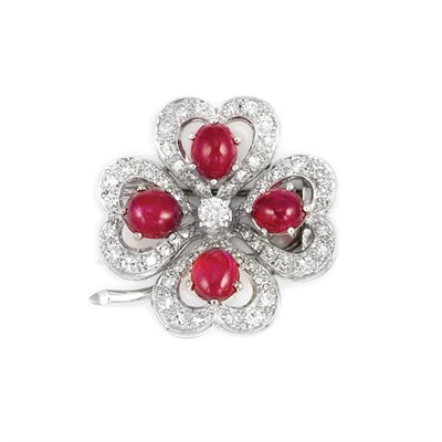 Lot 358 - White Gold, Cabochon Ruby and Diamond Four Leaf Clover Clip-Brooch