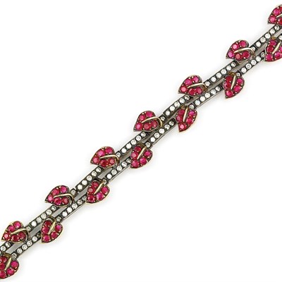 Lot 651 - Blackened Gold, Diamond and Ruby Bracelet
