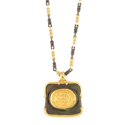 Lot 667 - Long Gold and Blackened Metal Pendant-Necklace