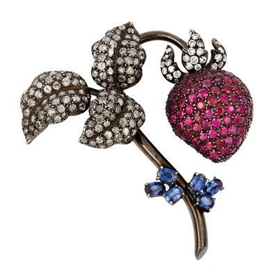 Lot 650 - Blackened Gold, Diamond, Ruby and Sapphire Strawberry Clip-Brooch