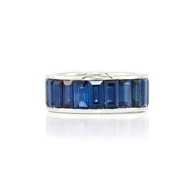 Lot 527 - Wide White Gold and Sapphire Band Ring