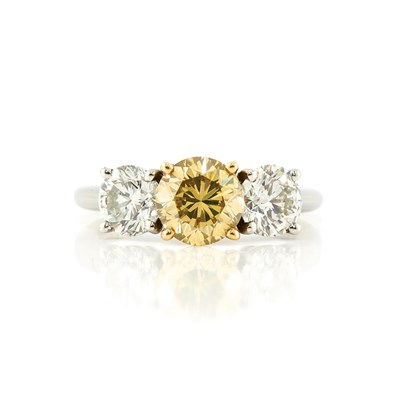 Lot 317 - Yellowish-Brown Diamond and Diamond Three Stone Ring