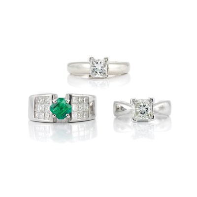 Lot 515 - Two White Gold, Platinum and Diamond Rings and Emerald and Diamond Ring
