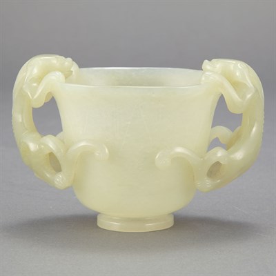 Lot 695 - Chinese Celadon Jade Cup Of footed form, the...