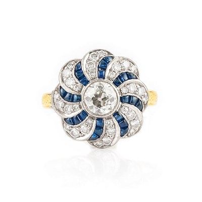 Lot 801 - Two-Color Gold, Diamond and Sapphire Ring