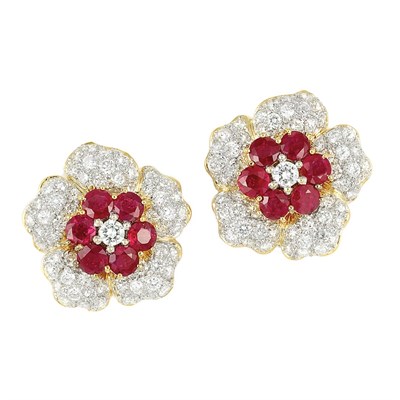 Lot 425 - Pair of Two-Color Gold, Ruby and Diamond Flower Earclips