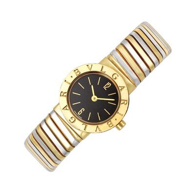 Lot 36 - Two-Color Gold Bangle-Watch, Bulgari