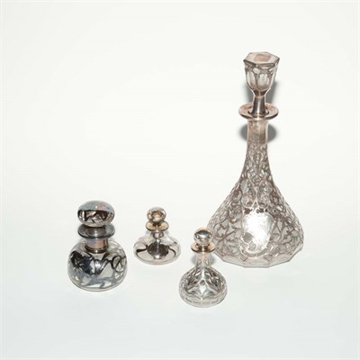 Lot 463 - Group of Nine Silver Overlaid Glass Scent Bottles
