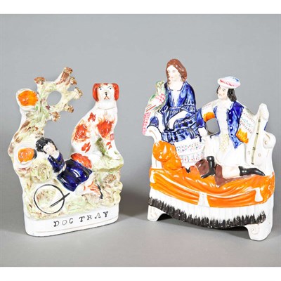 Lot 428 - Pair of Staffordshire Pottery Reclining...