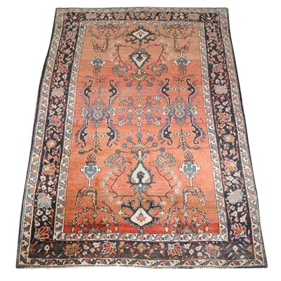 Lot 546 - Sarouk Rug Circa 1925 The russet field with...