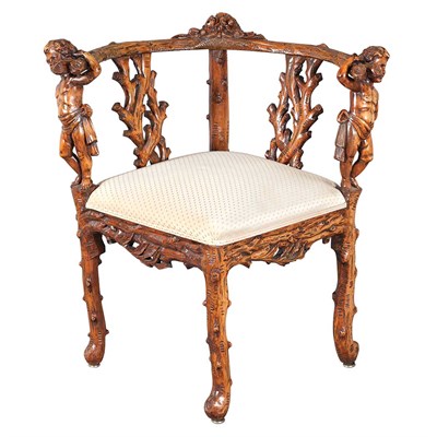 Lot 400 - Black Forest Style Carved Oak Corner Armchair
