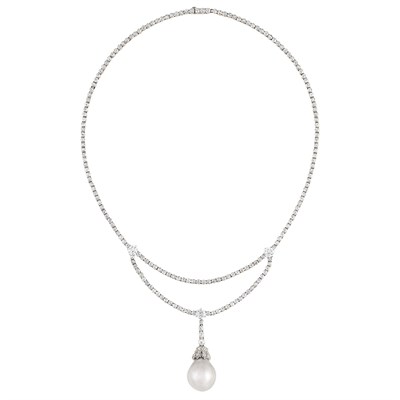 Lot 425 - Belle Epoque Platinum, Gold, Diamond and Natural Pearl Pendant-Necklace