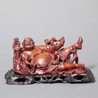 Lot 252 - Chinese Carved Wood Grouping of a Reclining...