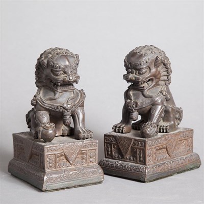 Lot 254 - Pair of Chinese Bronze Figures of Seated Foo...