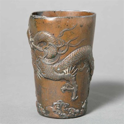 Lot 377 - Chinese Bronze Beaker Molded with dragons....