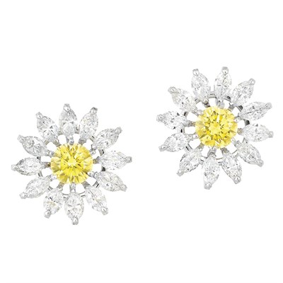Lot 567 - Pair of Platinum, Fancy Intense Yellow Diamond and Diamond Earclips