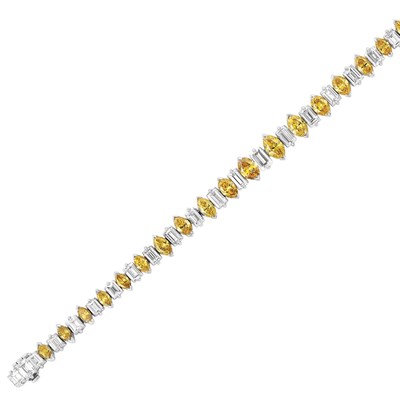 Lot 48 - Platinum, Irradiated Fancy Vivid Yellow Diamond and Diamond Bracelet