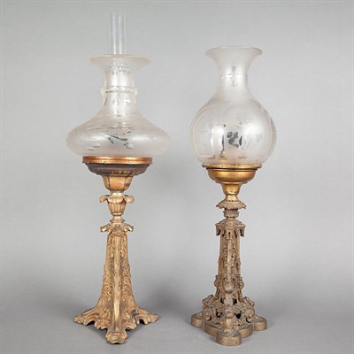 Lot 1465 - Two Bronze Oil Lamps Late 19th century Each...