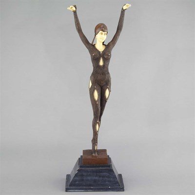 Lot 372 - Art Deco Style Faux Ivory and Bronze Figure of...