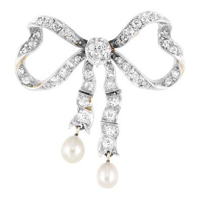 Lot 184 - Belle Epoque Platinum, Gold, Diamond and Pearl Bow Brooch