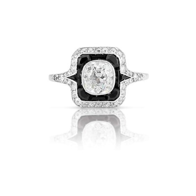 Lot 613 - Art Deco Platinum, Diamond and Black Onyx Ring