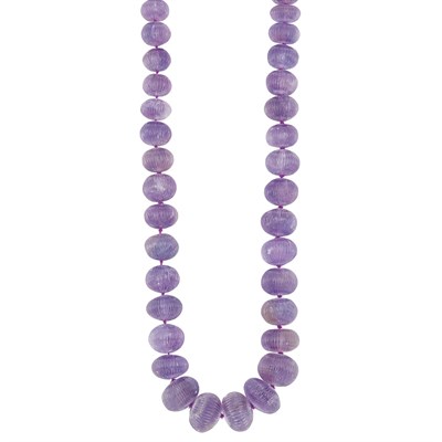 Lot 135 - Long Fluted Amethyst Bead Necklace