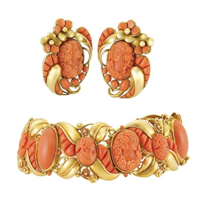 Lot 526 - Gold, Coral Cameo and Coral Cuff Bracelet and Pair of Clip-Brooches, Seaman Schepps