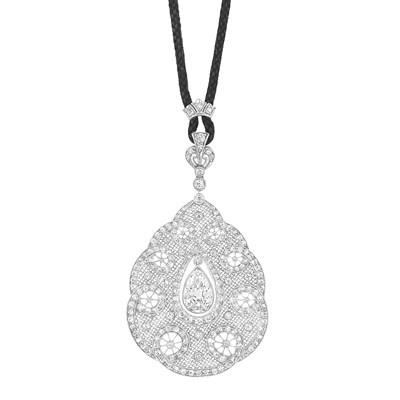 Lot 604 - Belle Epoque Platinum and Diamond Filigree Pendant with Black Cord Necklace