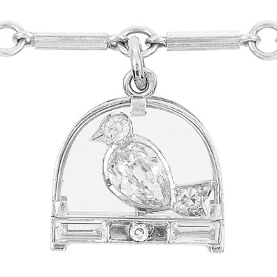 Lot 215 - Art Deco Platinum and Diamond Link Bracelet, Cartier, with Platinum, Rock Crystal and Diamond Bird Cage Charm