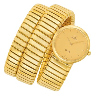 Lot 144 - Gold Coil Bangle-Watch, Omega