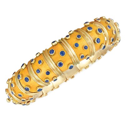Lot 507 - Gold, Orangy-Yellow Paillonne Enamel and Sapphire Bangle Bracelet, Tiffany & Co., Schlumberger, France