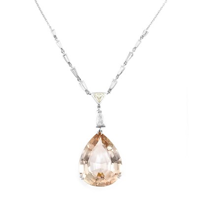 Lot 489 - White Gold, Topaz and Diamond Pendant with Platinum Chain