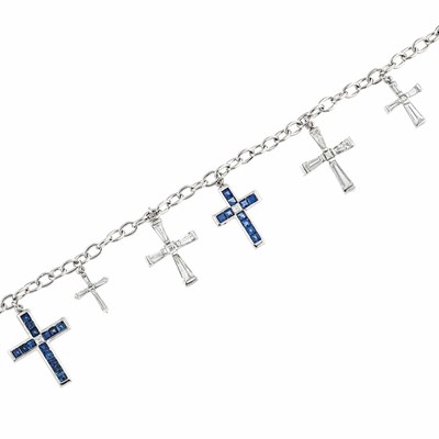 Lot 665 - White Gold, Diamond and Sapphire Cross Charm Bracelet