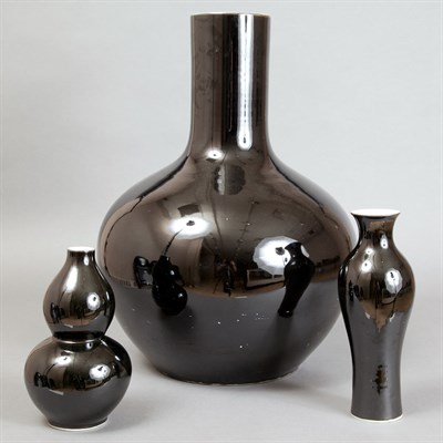 Lot 537 - Group of Seven Black Glazed Porcelain Vases...