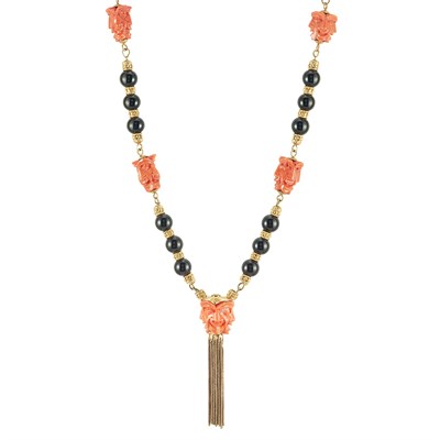 Lot 527 - Long Gold, Carved Coral and Black Onyx Bead Fringe Necklace, Graff