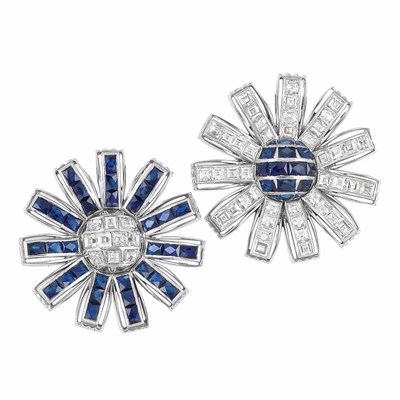 Lot 589 - Pair of Platinum, Diamond and Sapphire Flower Clip-Brooches, Marianne Ostier
