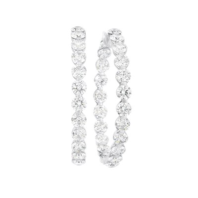 Lot 557 - Pair of White Gold and Diamond Hoop Earrings