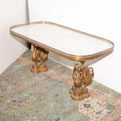 Lot 103 - Empire Style Gilt-Metal Low Table The oval...
