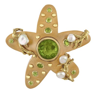 Lot 521 - Wood, Gold, Peridot and Freshwater Pearl Starfish Brooch, Seaman Schepps