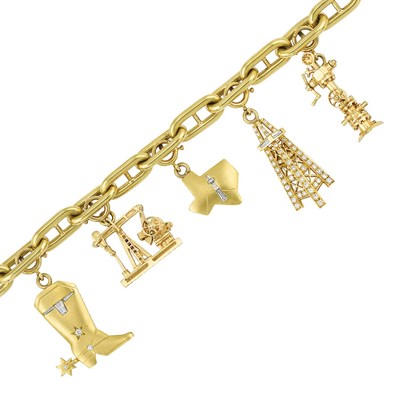 Lot 140 - Gold and Diamond Charm Bracelet