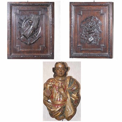Lot 161 - Pair of Continental Stained Oak Wall Appliques...