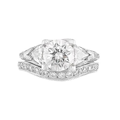 Lot 114 - Platinum and Diamond Ring and Guard Ring