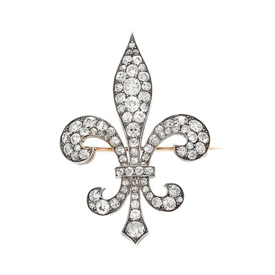 Lot 679 - Antique Platinum, Gold and Diamond Fleur-de-Lys Brooch