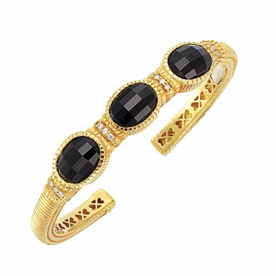 Lot 742 - Gold, Black Onyx and Diamond Bangle Bracelet, Judith Ripka