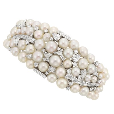 Lot 498 - White Gold, Cultured Pearl and Diamond Bangle Bracelet
