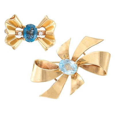 Lot 132 - Two Retro Gold, Blue Topaz and Diamond Bow Pins