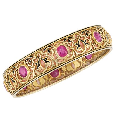 Lot 527 - Art Nouveau Gold, Pink Plique-a-Jour Enamel, Ruby, Synthetic Ruby and Black Enamel Bangle Bracelet, Marcus & Co.
