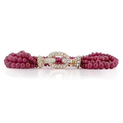 Lot 295 - Six Strand Ruby Bead Torsade Bracelet with Gold and Diamond Clasp, France